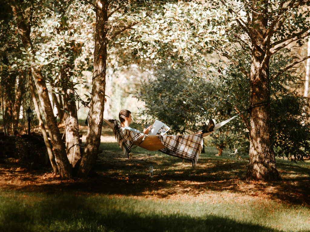 Reading in a hammock in the Őrség